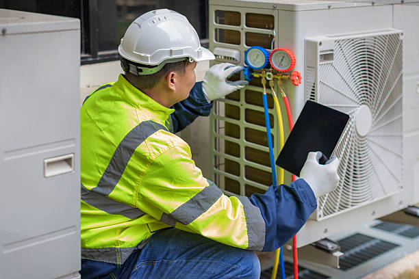 Professional Hvac technician working in Okauchee, WI